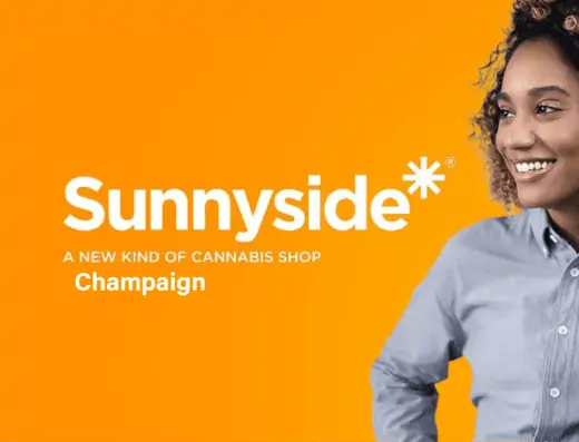 A woman is standing in front of an orange background at the Sunnyside cannabinoid shop.