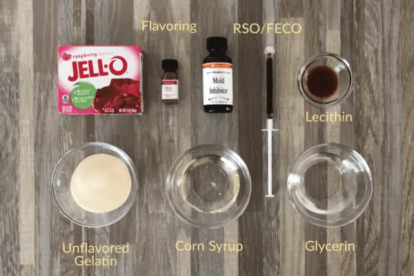 The ingredients to make RSO or FECO-infused gummy bears are laid out on a table. 