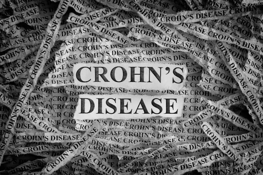 This image shows paper clippings all with the word Crohn's disease and a label in front saying the same thing.