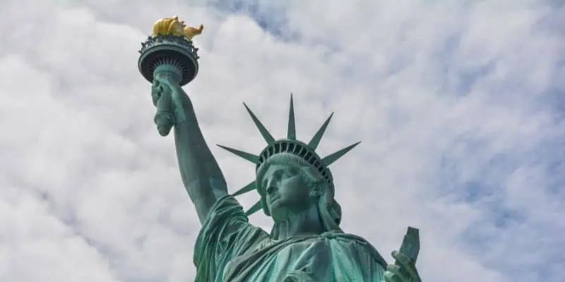 This photo shows the lady of liberty against a blue sky background.