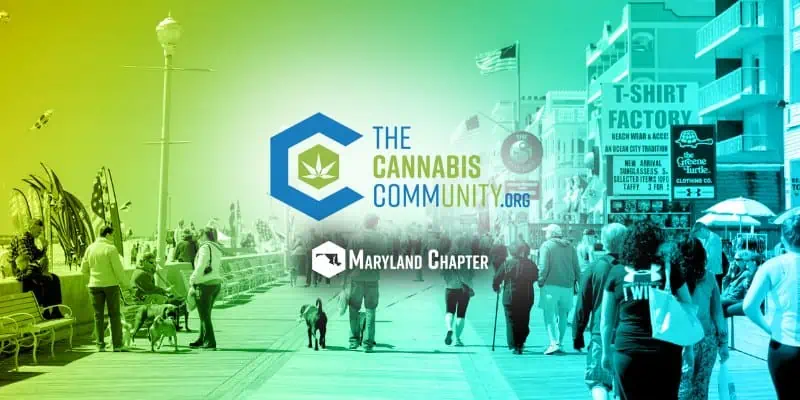 People walking in down a boardwalk with the cannabis community logo and a sign that reads "Maryland chapter"