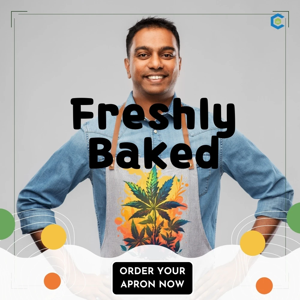 A man with his hands on his hips stands proudly wearing his freshly baked weed apron featuring growing pot leaves on a warm orange and yellow background.