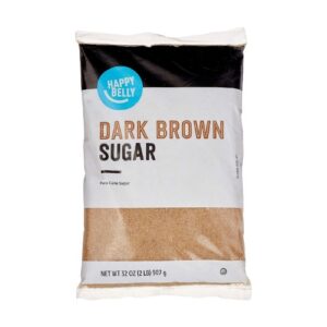 A bag of dark brown sugar on a white background.