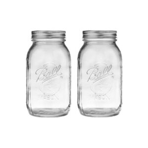 Two clear mason jars on a white background.