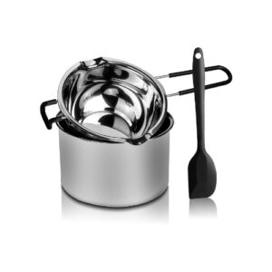 A stainless steel pot with a spoon and spatula.