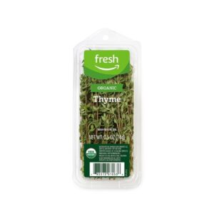 A package of fresh thyme on a white background.