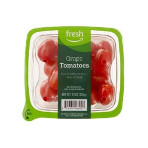 Fresh grape tomatoes in a plastic container.