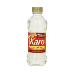 A bottle of karo on a white background.
