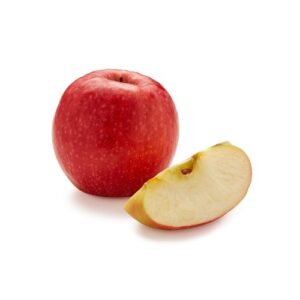 A red apple with a slice cut in half on a white background.