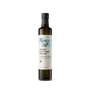 A bottle of olive oil on a white background.