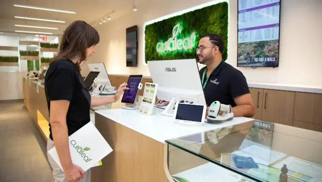 Curaleaf Queens Budtenders at the counter.