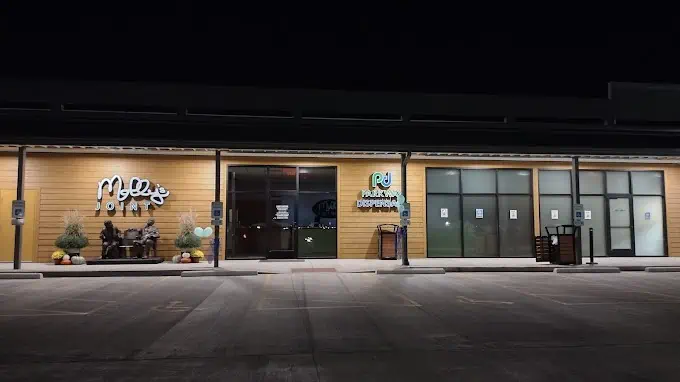 Parkway Dispensary Tilton Cannabis Store front door entrance at night